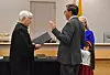 Los Lunas Magistrate Judge Avilio Chavez swears in Frank Otero to the Los Lunas Board of Education on, Tuesday, Jan. 7.