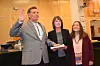 Steve Holdman, left, is sworn in as a Belen city councilor as his family looks on at the city's swearing-in ceremony on Monday, Jan. 8